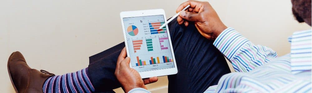A person looking at the data on the tablet