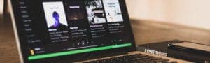 Laptop with Spotify on the screen