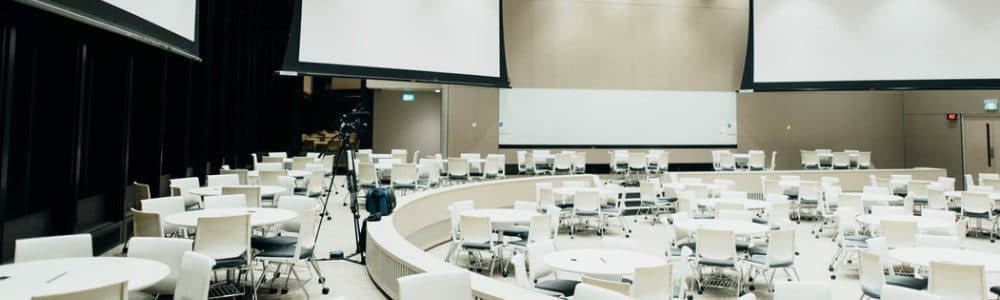 photo of empty room with projector screen